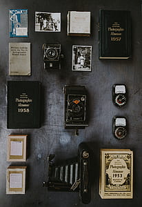 flat-lay photography of vintage cameras thumbnail