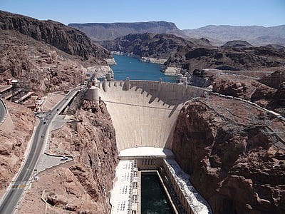 aerial photography of mountains, road, and body of water thumbnail