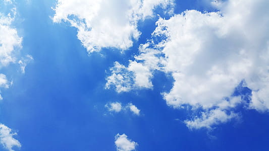 cumulus clouds and blue calm sky thumbnail