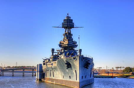 gray battle ship on harbor thumbnail