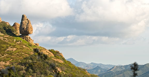 green grass covered mountain cliff thumbnail
