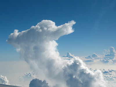 white clouds under clear blue sky during daytime thumbnail