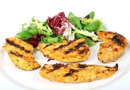 cooked chicken platter served with green and purple leafy vegetables thumbnail