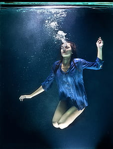 woman swimming underwater thumbnail
