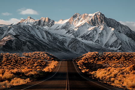 photography of mountain covered snow at daytime thumbnail