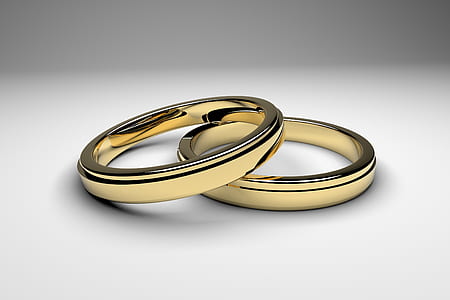 two gold-colored coins thumbnail