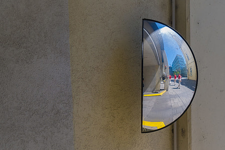 Close-up street shot of a half-mirror, image captured in Linz, Austria thumbnail