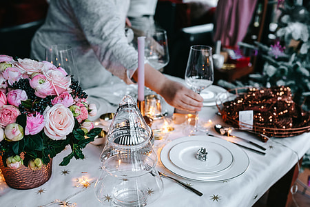 Hands Decorating Christmas Table thumbnail