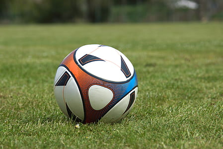 soccer ball in grass thumbnail
