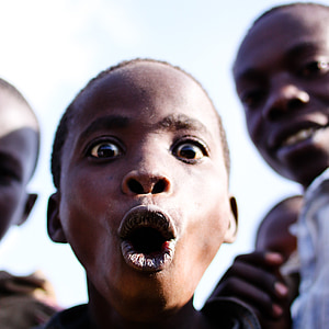 boy opens his mouth and widely open his eyes thumbnail