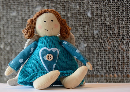 teal knitted doll thumbnail