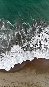 aerial photography of ocean waves thumbnail