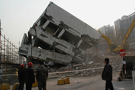 people watching wrecked building thumbnail