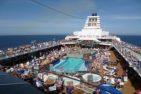 photo of crowded cruiser ship at daytime thumbnail