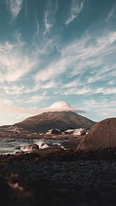 mountain top covered with clouds thumbnail