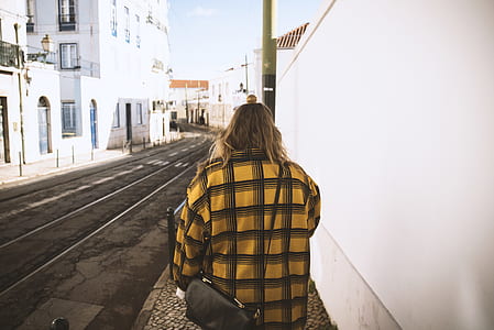person walking on sidewalk thumbnail