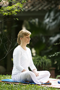 woman in white shirt meditating during daytime thumbnail