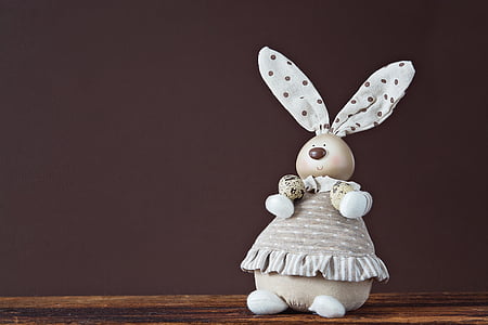 rabbit plush toy on wooden surface thumbnail
