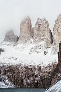 snow covered hill during daytime thumbnail