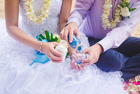 man holding bowl pouring liquid on bottle thumbnail