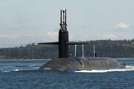 black submarine in body of water thumbnail