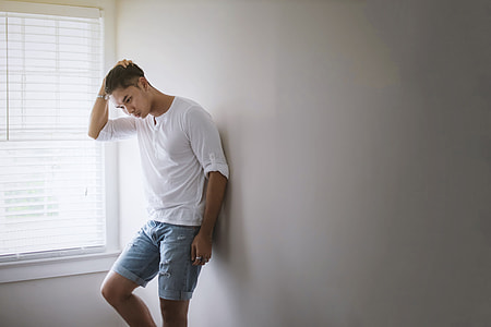 black hair man wearing white henley's shirt and denim short thumbnail