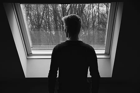 man staring at the window thumbnail