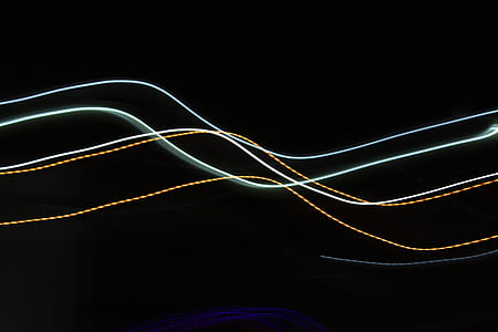 white and beige lights with black background thumbnail