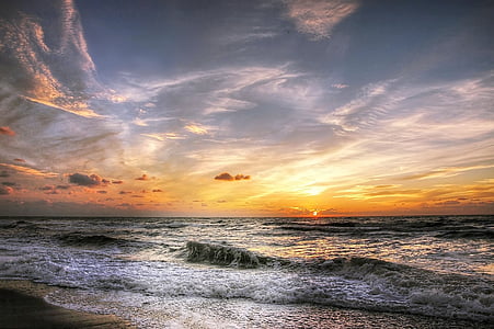 photo of seashore during golden hour thumbnail