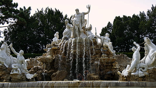 white and beige fountain during daytime thumbnail