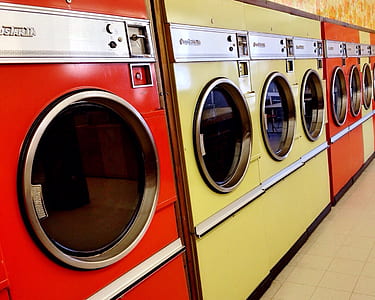 red and yellow front-load clothes dryers thumbnail