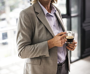 person wearing gray coat thumbnail