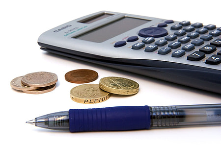 gray and black calculator beside of blue ball pen and coins thumbnail