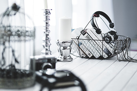 Black smartphone and headphones with various items thumbnail
