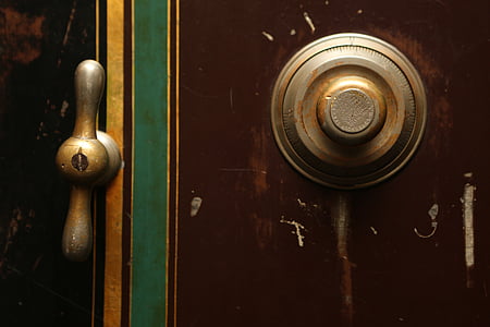 two brass-colored personal safe knobs thumbnail