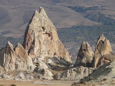 brown monolith outdoors thumbnail