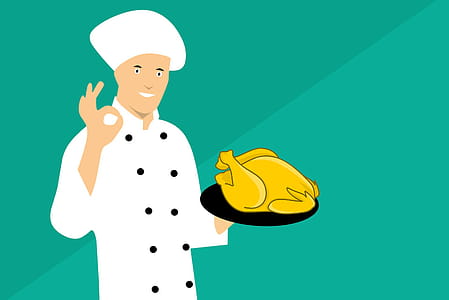 Chef holding a chicken and flashing the okay sign. thumbnail
