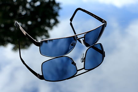 blue sunglasses with black frames thumbnail