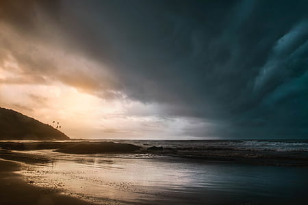 seashore under the cloudy sky thumbnail