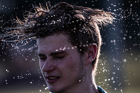 man whirling hair during daytime thumbnail