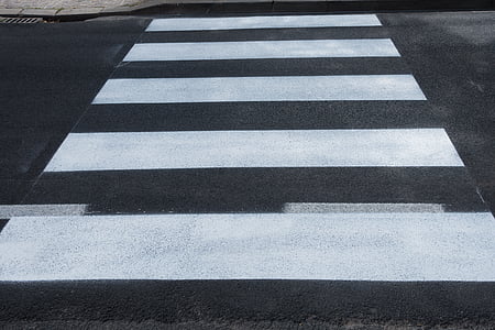 white pedestrian lane on road thumbnail