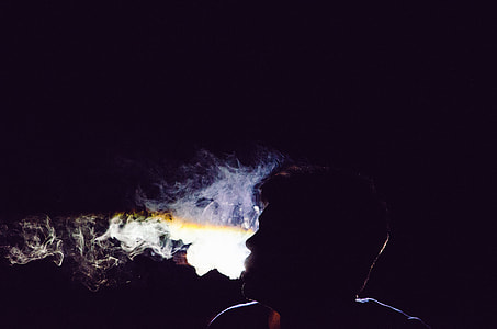 silhouette of man smoking thumbnail