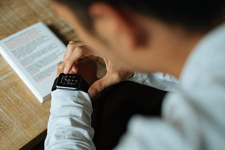 man sitting in front of table thumbnail