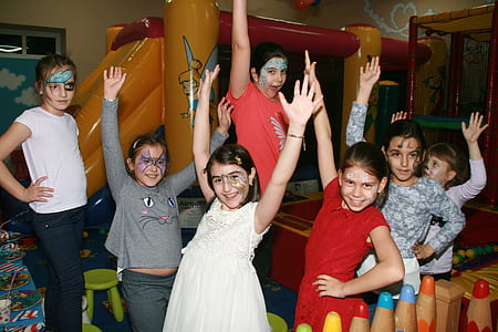 group of children raising their arms thumbnail