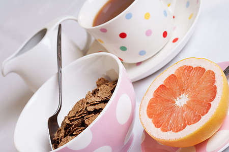 choco flakes cereal beside stainless steel spoon on white ceramic bowl thumbnail