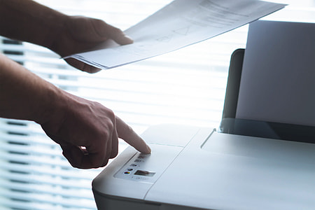 Man using office printer thumbnail