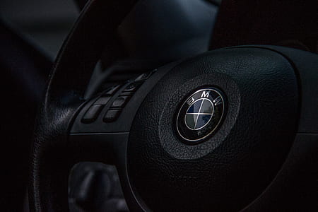 black BMW multi-function steering wheel thumbnail