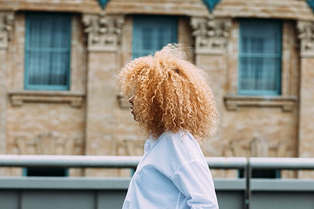 woman standing front of building thumbnail