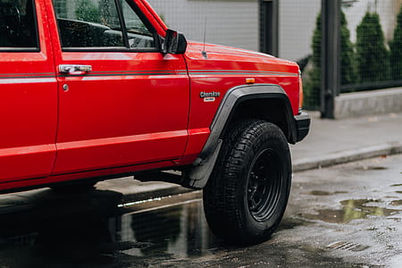 Old red Jeep Cherokee thumbnail