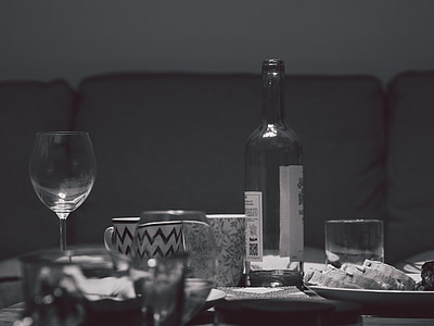 shallow focus photography of clear glass wine bottle and wine glass thumbnail